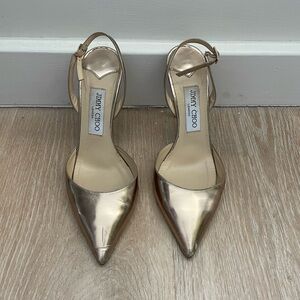 Gold close toed Jimmy Choo Pumps
